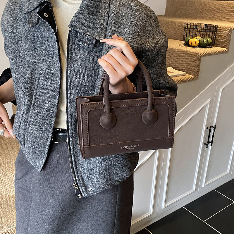 Handheld small bag for women, new arrival, high-end retro patchwork design, versatile and stylish shoulder bag with a premium feel, and a fashionable crossbody bag