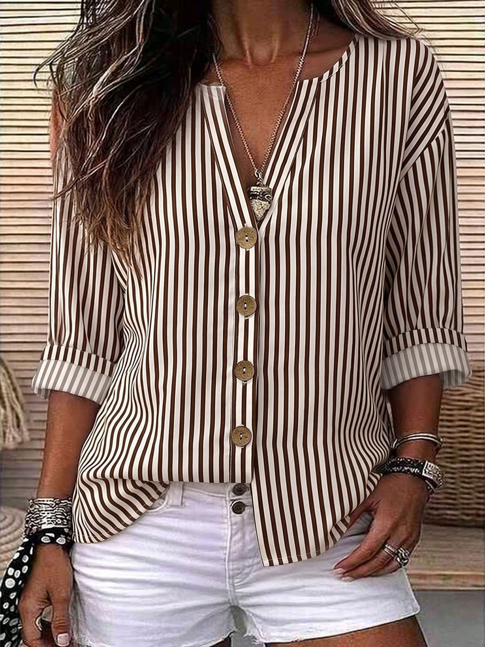 Fashion holiday style vertical pattern blouse, light fabric, half placket, wooden buttons, loose three-quarter sleeves, daily casual lining