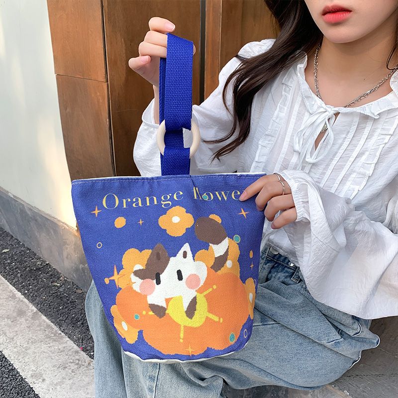 Cute cartoon canvas tote bag for women, 2024 new style handheld bucket bag, large capacity lunch bag, fashionable cloth handbag