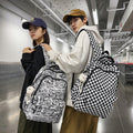 Niche style american graffiti junior high school and college students large capacity backpack stylish checkerboard grids high school student backpack