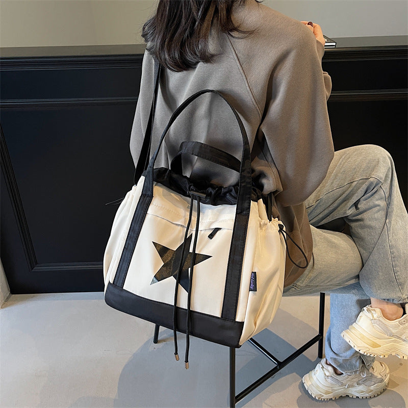 Canvas cloth bag New large-capacity anti-splashing fabric messenger bag Student commuting shoulder bag Casual advanced
