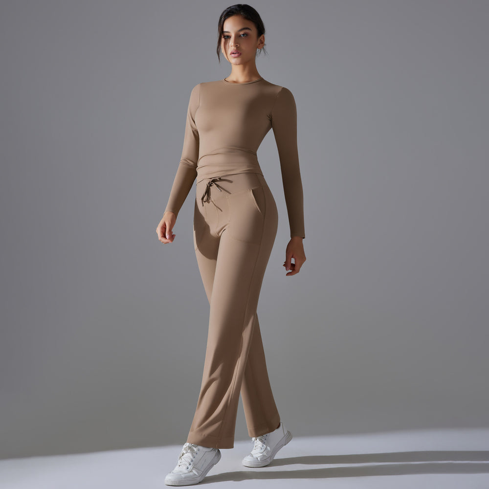 High-waisted, butt-lifting, drawstring wide-leg pants with a barely-there feel, paired with a form-fitting, long-sleeved yoga top. breathable, quick-drying, perfect for outdoor running and fitness