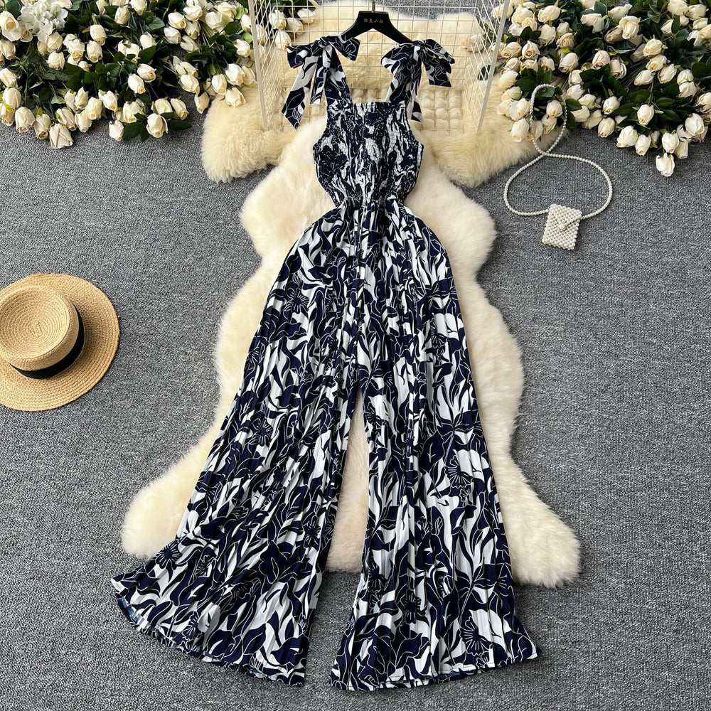 Women's summer jumpsuit for travel & vacation: stretchy, ruched, cinched waist, floral print, spaghetti strap, wide leg, long pants, beachwear