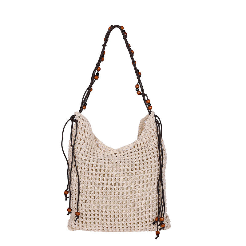 Cross-border niche design mesh bag hollow woven tote bag shoulder messenger bag 2025 new leisure style beach bag