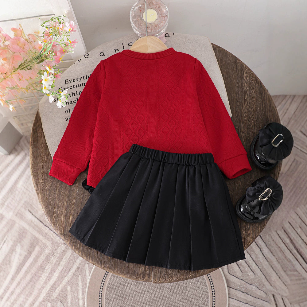 Girls' elegant long-sleeve top and pleated skirt set