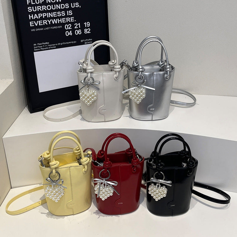 Cross-border high-end foreign-style handbag women's 2025 trendy niche design bucket bag popular versatile messenger bag