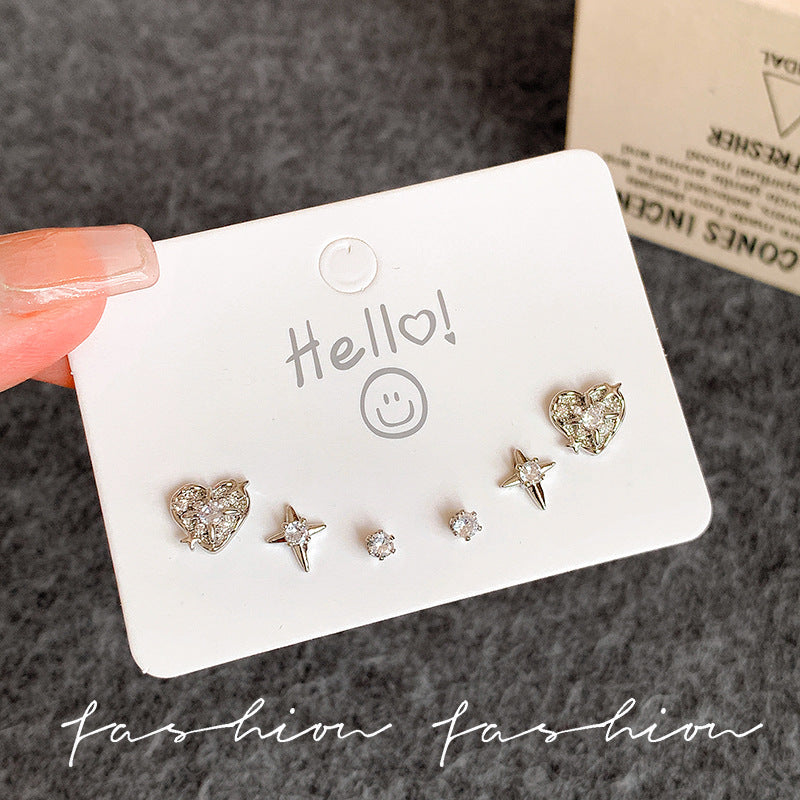 Sweet and cool style multi-pair set of heart-shaped starburst stud earrings, exquisite zircon combination earrings, niche high-end elegant earrings