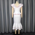 Elegant women's ruffle trim color block top and figure-flattering fishtail midi skirt two-piece set