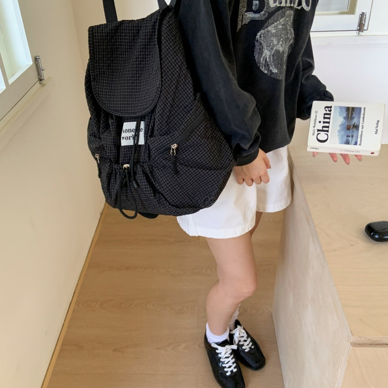 Multi-pocket plaid fashion commuter nylon student backpack - 2025 autumn korean style large capacity drawstring backpack for women