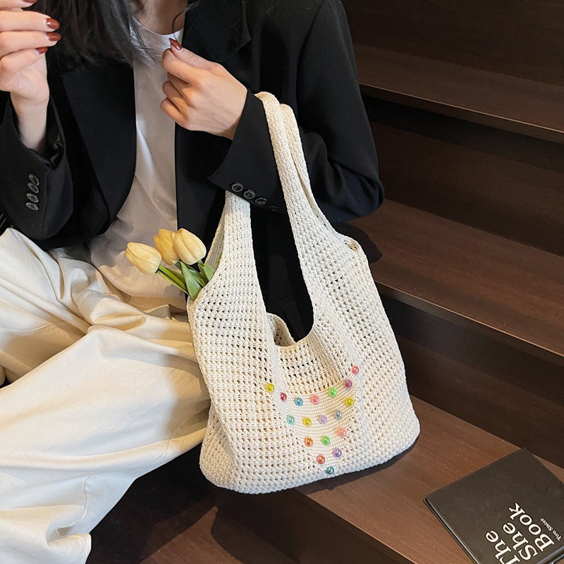 Seaside commuter shoulder tote bag vacation woven bag women's summer colored pearl hollow large capacity underarm bag women