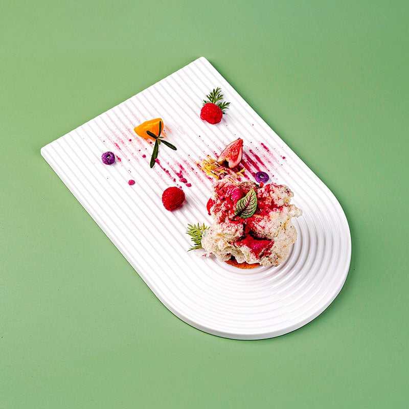 European minimalist pure white ceramic striped dessert and pastry platter, suitable for restaurants, hotels, and home use. unique ceramic long plate