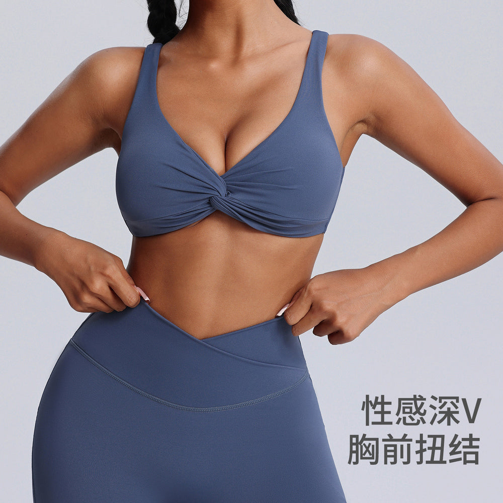 Fashionnew arrivalnude sports intimatesfemale sexy twist shockproof yoga bra beautiful back containing breast pad sports bra