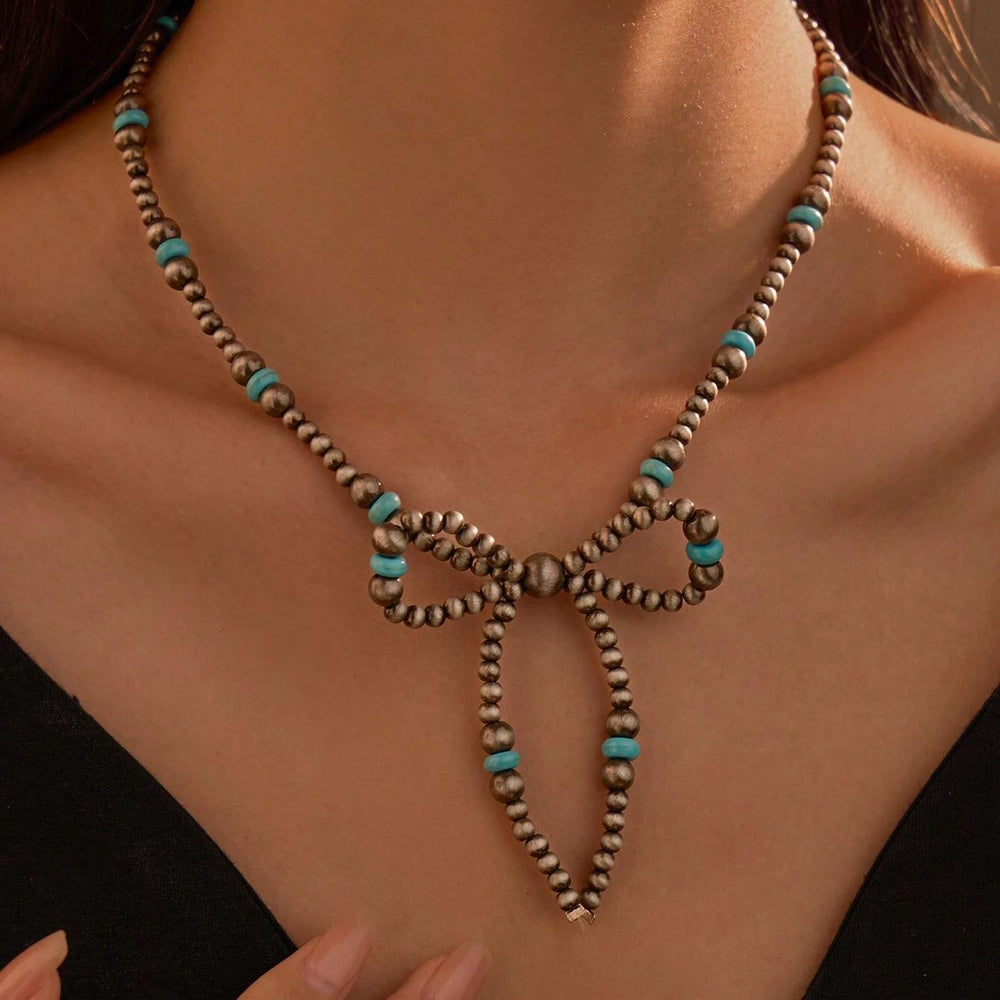 European and american cross-border jewelry amazon hot-selling bow necklace turquoise imitation pearl western cowboy style necklace
