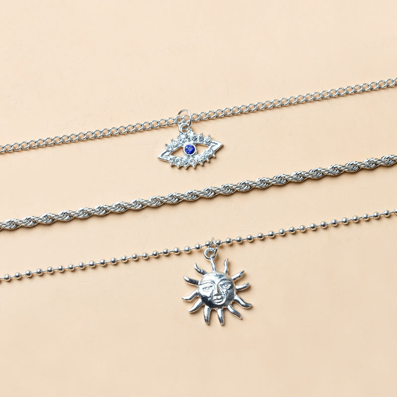 Wholesale devil's eye necklace - cross-border alloy jewelry, unique sun pendant, women's multi-layer necklace, trendy ins style accessories