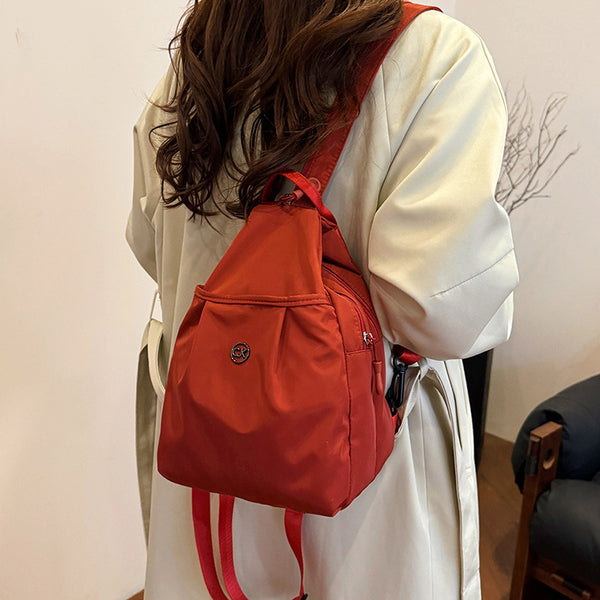 Travel backpack women 2025 new breast bag light commuter messenger bag sports shoulder mountaineering small backpack