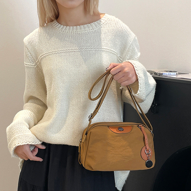 Light commuter women's shoulder bag fashionable and simple versatile messenger bag  large-capacity water-proof boys cloth bag