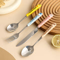 Cartoon stainless steel cutlery set: cute kids' forks with stylish ceramic handles, exquisite dessert spoons, and serving spoons