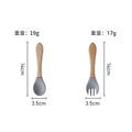 Gray wooden handle fork and spoon