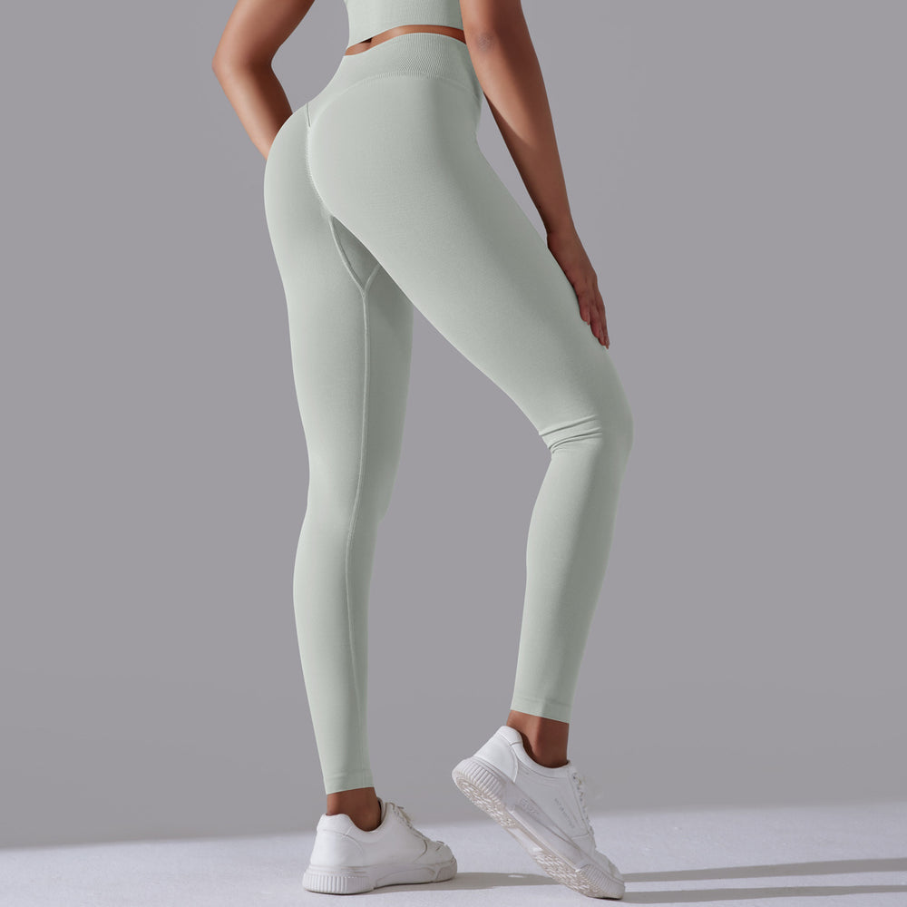 European and american new seamless yoga outfit sexy open-back workout set high-waisted butt-lifting leggings running fitness set