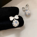 Silver needle cat's eye bow s-style pearl earrings - unique, beautiful, exquisite 5a zircon studs - high-end earrings