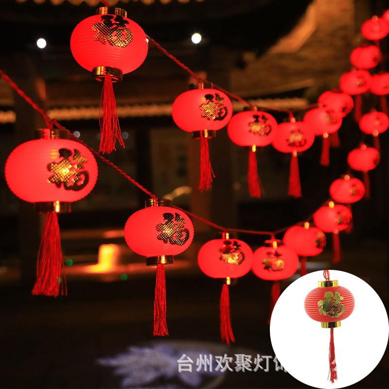 LED lantern string, Chinese New Year lanterns, Spring Festival flashing lights, festive Lantern Festival, New Year's fringed red lanterns