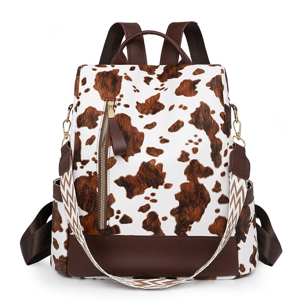 Women's travel backpack, foreign style cow pattern anti-theft shoulder backpack, commuting anti-splashing PU light schoolbag