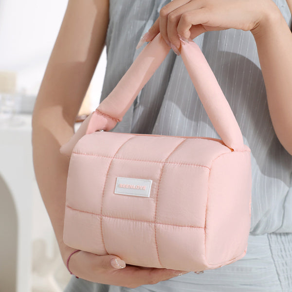 Beilian cotton-filled cosmetic bag, simple and fashionable travel handbag, skin care products, lipstick, large-capacity storage bag, wholesale.