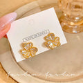 S925 sterling silver needle zircon clover flower earrings - women's luxury, high-end, unique, and elegant stud earrings