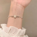 Korean style pearl camellia flower bracelet - women's lightweight luxury, niche, exquisite, high-end, versatile jewelry - wholesale trendy accessories