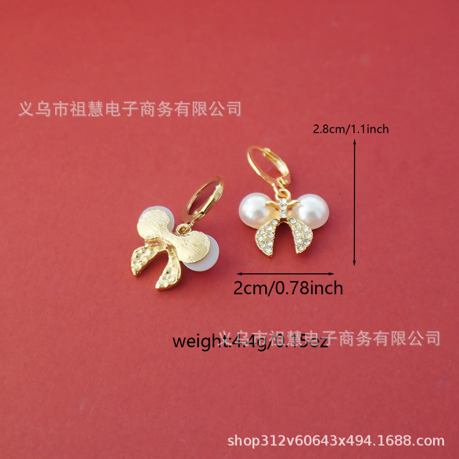 wholesale: a pair of trendy bow earrings. gold-plated bow tie earrings, perfect for everyday wear