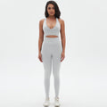 New arrival cross-border seamless pure color tight sexy cross-shaped yoga suit running fitness two-piece set