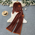 European and american style women's autumn outfit: chic, loose-fit, casual letter embroidered long-sleeve knit top with high-waisted wide-leg pants