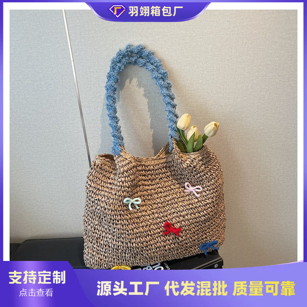 Cross-border beach vacation wind straw woven bag women's 2025 new leisure large-capacity woven bag commuter shoulder tote bag