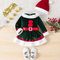 Baby christmas party outfit: fuzzy hat, belt, and romper dress