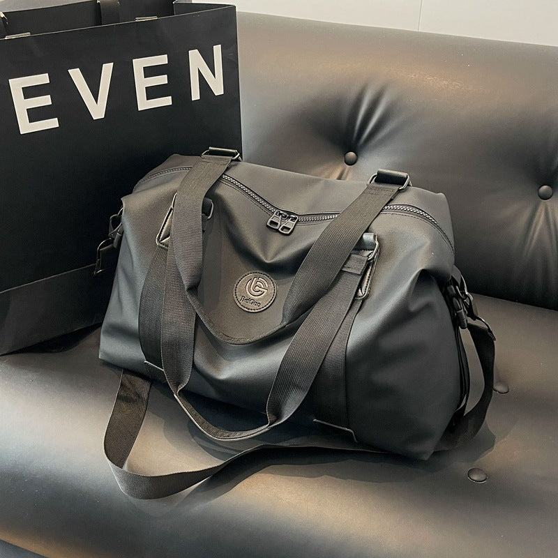 New travel bag women's travel portable hand luggage bag Korean version large-capacity messenger sports fitness bag travel bag