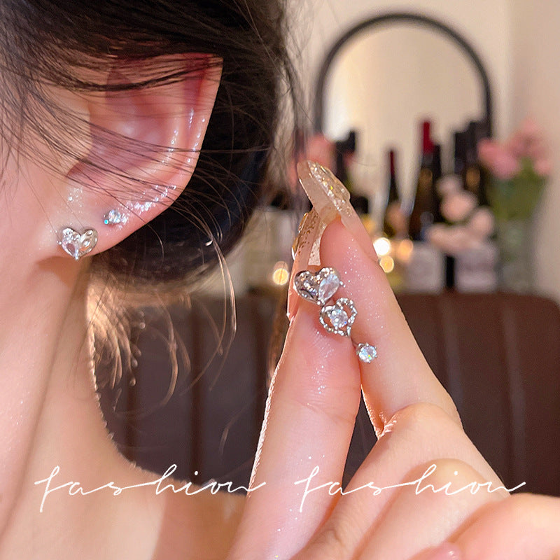 Sweet and cool style multi-pair set of heart-shaped starburst stud earrings, exquisite zircon combination earrings, niche high-end elegant earrings