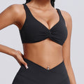 Fashionnew arrivalnude sports intimatesfemale sexy twist shockproof yoga bra beautiful back containing breast pad sports bra