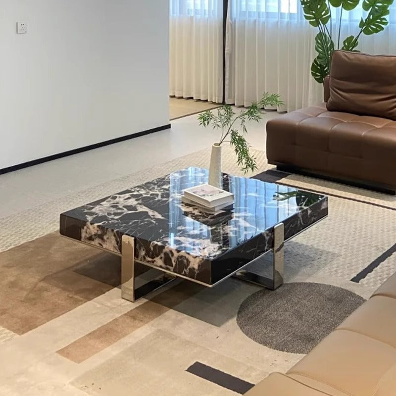 Italian minimalist marble coffee table, suitable for living rooms of all sizes. a touch of understated luxury, designed by a minimalist designer. available as a set of square coffee tables