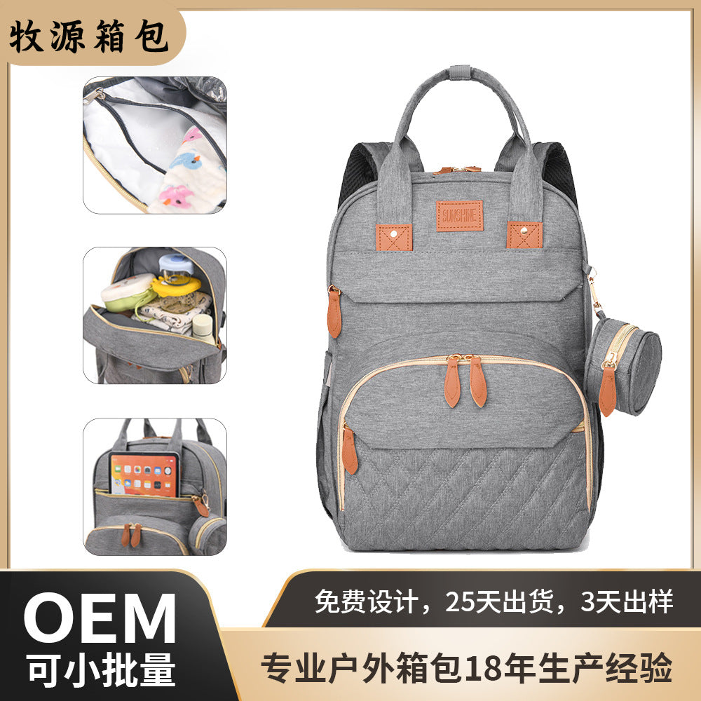 Cross-border customized large-capacity mommy bag, multi-functional mother and baby bag, thermal insulation bottle warehouse, casual outdoor backpack.