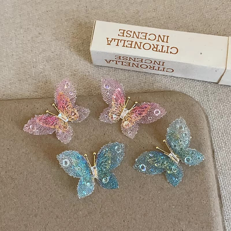 High-end, ethereal gradient 3d butterfly stud earrings for women. unique, niche design, fashionable, elegant, and versatile