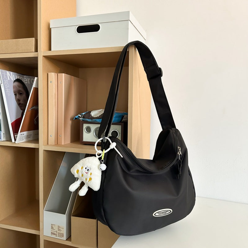 Foreign single nylon cloth bag women's large capacity 2025 new summer versatile shoulder messenger bag casual commuter dumpling bag