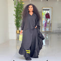 African-inspired loose fit batwing sleeve top and color block striped wide leg pants two-piece set