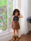 cross-border girls' fashion bowknot solid color camisole + pu leather skirt two-piece set
