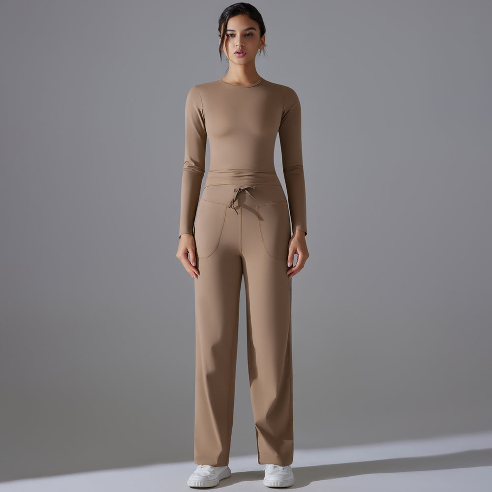 High-waisted, butt-lifting, drawstring wide-leg pants with a barely-there feel, paired with a form-fitting, long-sleeved yoga top. breathable, quick-drying, perfect for outdoor running and fitness