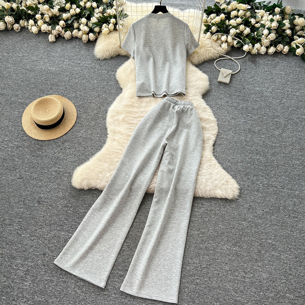 Casual outfit set for women: summer designer denim patchwork short-sleeve top and high-waisted wide-leg straight pants set