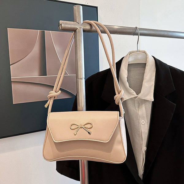 Sweet bow commuter French underarm bag 2025 solid color spring new simple fashion shoulder messenger bag women