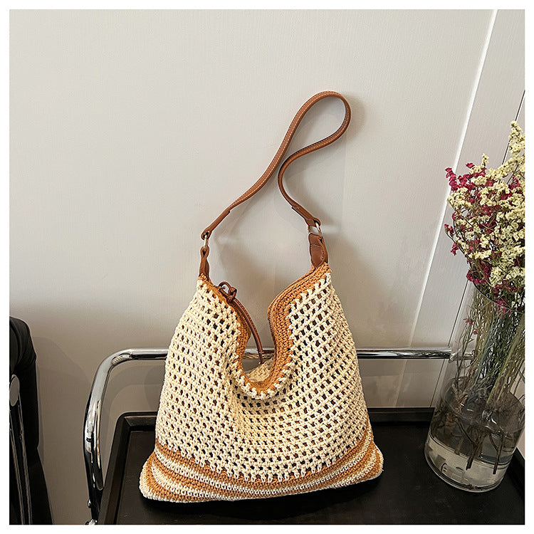 Cross-border trendy fashion hollow straw woven underarm bag women's 2025 summer simple temperament large capacity casual shoulder bag