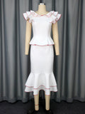 Elegant women's ruffle trim color block top and figure-flattering fishtail midi skirt two-piece set