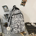 Niche style american graffiti junior high school and college students large capacity backpack stylish checkerboard grids high school student backpack