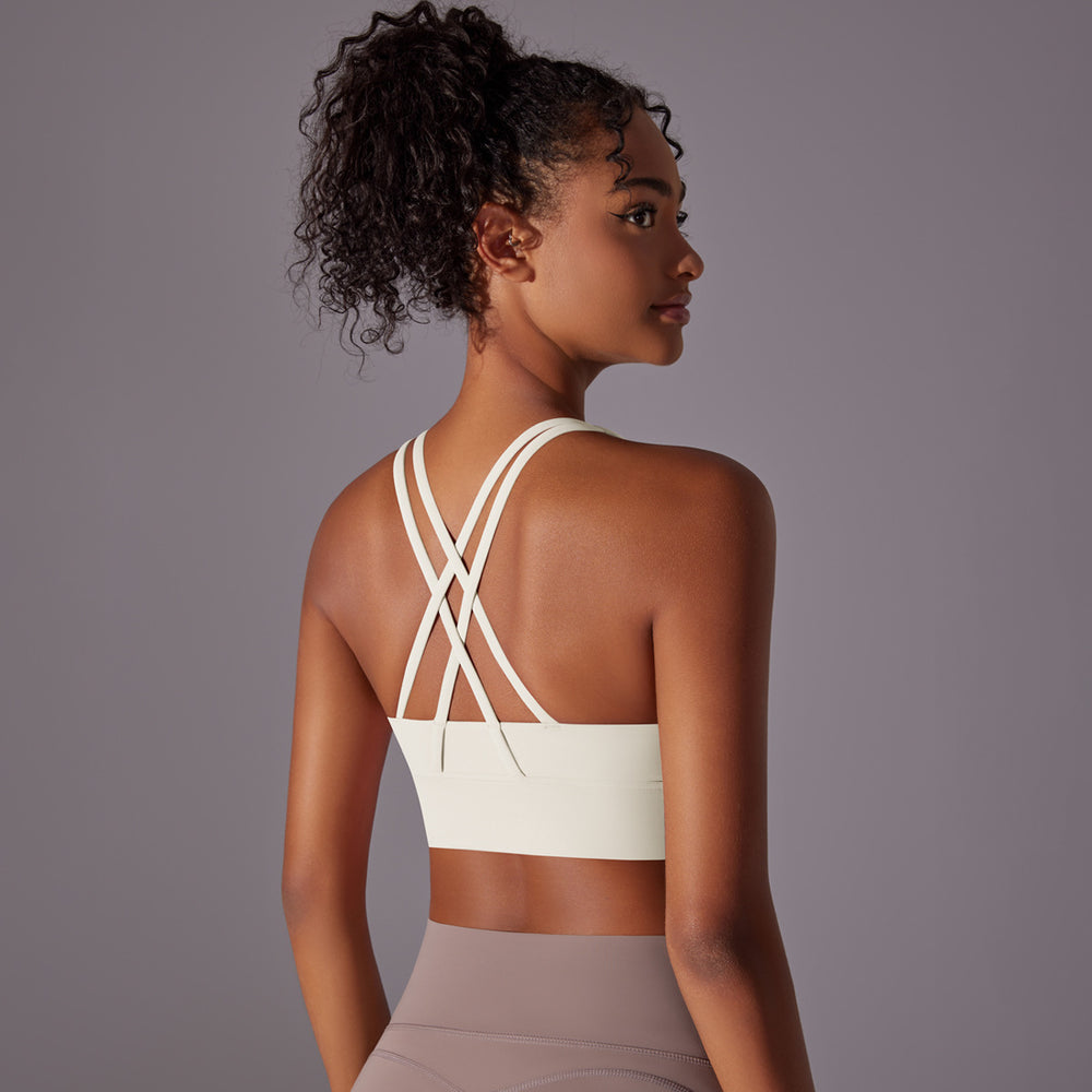 Fashion nude yoga vest women's cross back sports intimates bubble wrap push up seamless one-piece cup fitness bra